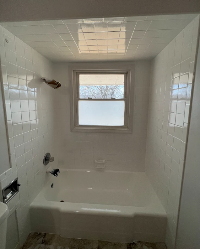 Reglazed stall and bathtub