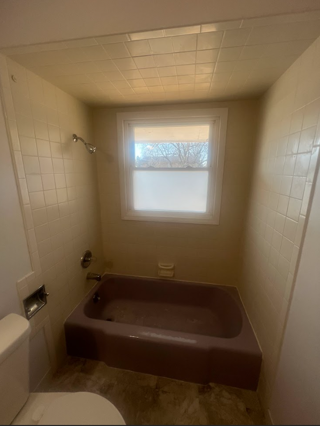 Image of fresh white newly reglazed tub and shower.